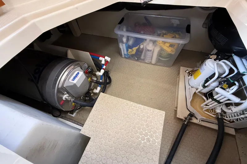  Yacht Photos Pics Engine room of 2021 Ranger Tugs R-41CB with equipment and storage box.