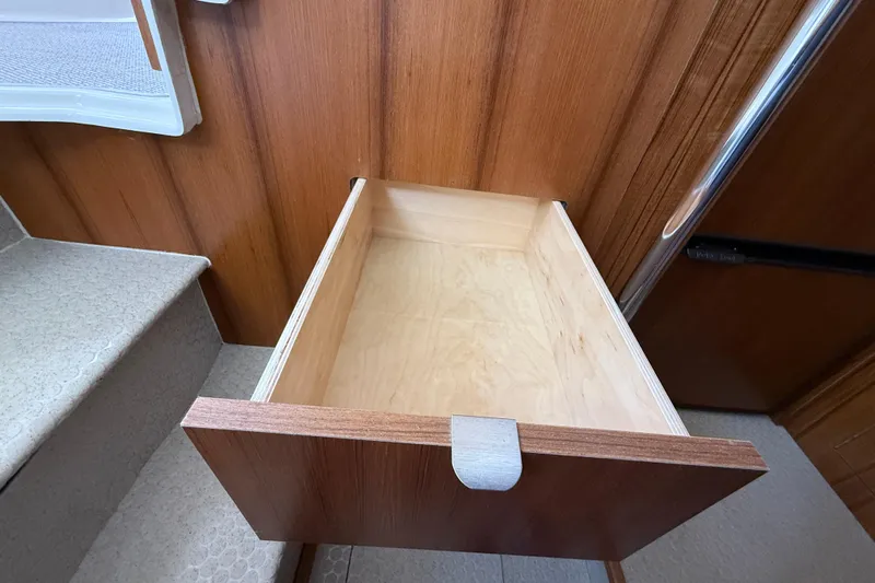  Yacht Photos Pics Empty wooden drawer in 2021 Ranger Tugs R-41CB boat interior.