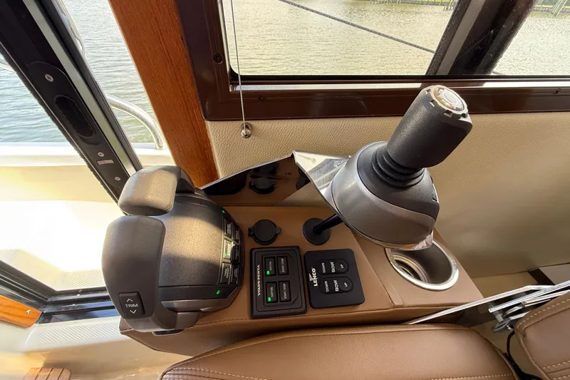  Yacht Photos Pics Control panel of 2021 Ranger Tugs R-41CB boat with joystick and throttle.