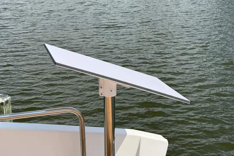  Yacht Photos Pics Satellite dish on 2021 Ranger Tugs R-41CB boat, overlooking water.