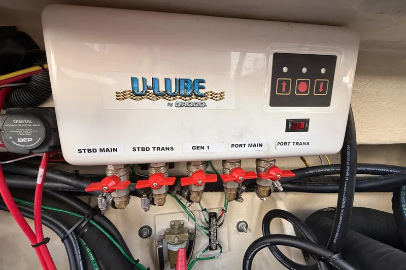  Yacht Photos Pics Control panel of a 2021 Ranger Tugs R-41CB with labeled valves and wiring.