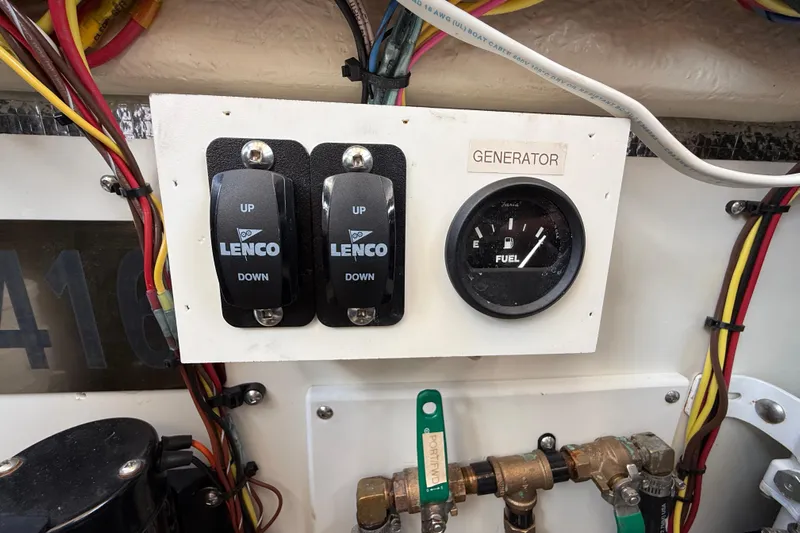  Yacht Photos Pics Control panel of a 2021 Ranger Tugs R-41CB with Lenco switches and fuel gauge.