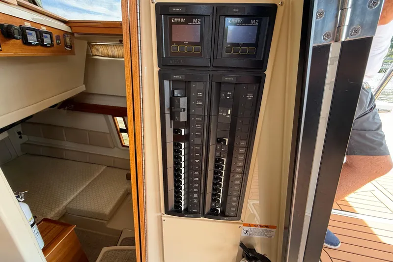  Yacht Photos Pics 2021 Ranger Tugs R-41CB interior showing control panel and cabin area.