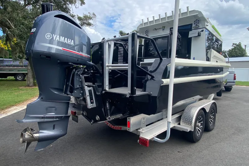  Yacht Photos Pics 2024 Sea King 260 boat with Yamaha outboard engine on a trailer.