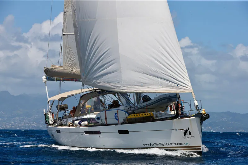 My Black Pearl Yacht Photos Pics 2015 Jeanneau 57 sailboat navigating ocean waters under clear blue skies.