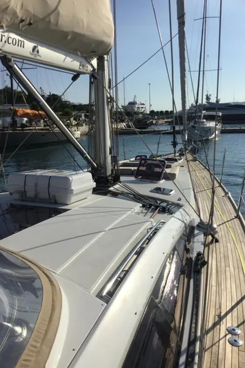 My Black Pearl Yacht Photos Pics 2015 Jeanneau 57 yacht docked in marina, showcasing sleek deck and rigging.