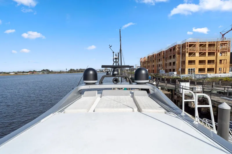 Double Down Yacht Photos Pics Mangusta 72 Express yacht docked by waterfront construction, clear sky, 2010 model.