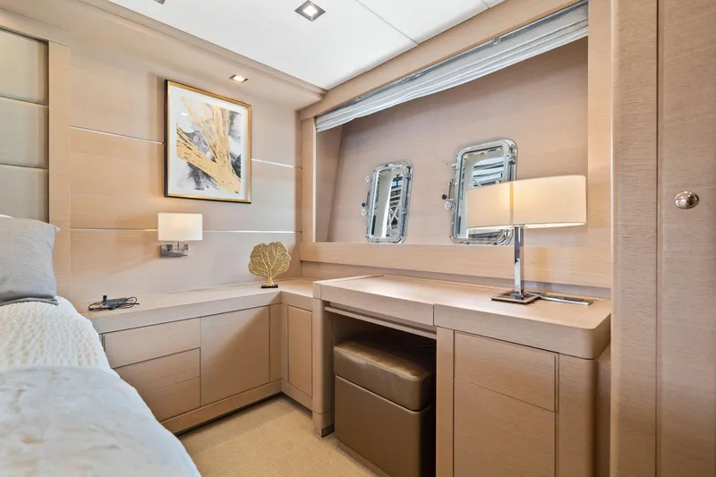 Double Down Yacht Photos Pics Luxurious interior of 2010 Mangusta 72 Express yacht with elegant wood finish and modern decor.