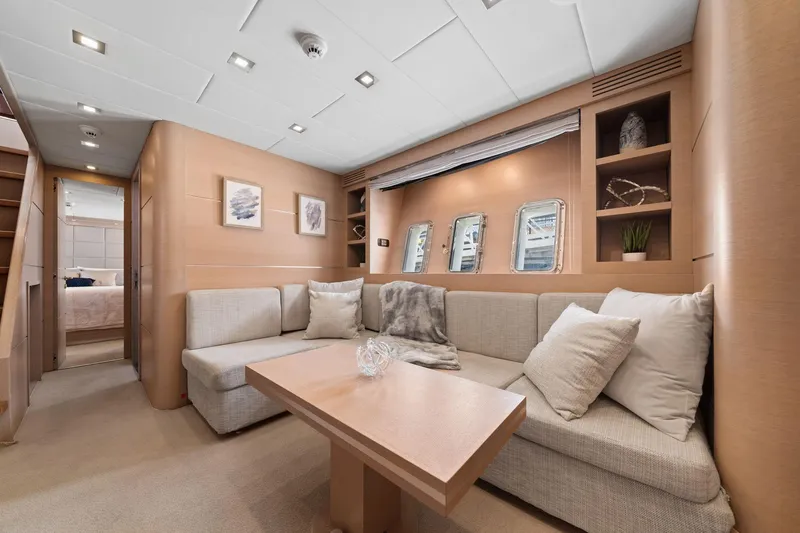 Double Down Yacht Photos Pics Luxurious interior of 2010 Mangusta 72 Express yacht with elegant seating and decor.