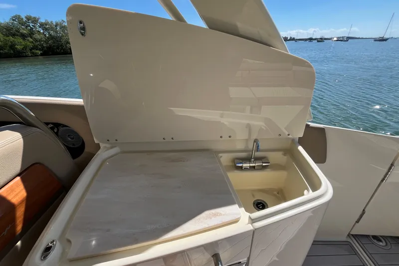  Yacht Photos Pics 2022 Chris-Craft Launch 35 GT I/O boat sink and counter with scenic water view.