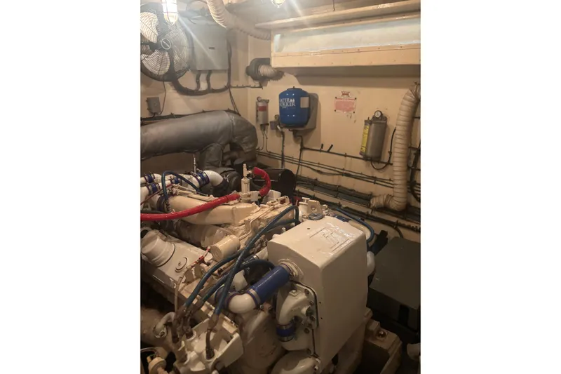 Ruby Yacht Photos Pics Engine room of 1981 Hatteras 56 Motor Yacht with visible machinery and wiring.