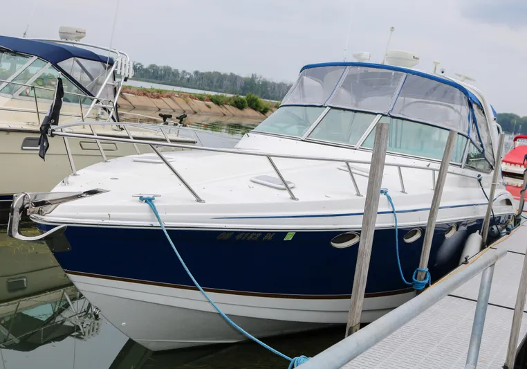  Yacht Photos Pics 2003 Formula 370 Super Sport boat docked at marina.