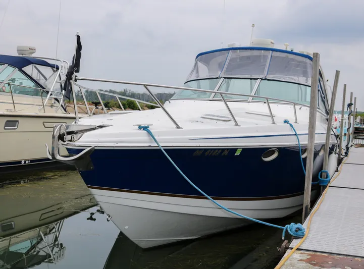  Yacht Photos Pics 2003 Formula 370 Super Sport boat docked at a marina.