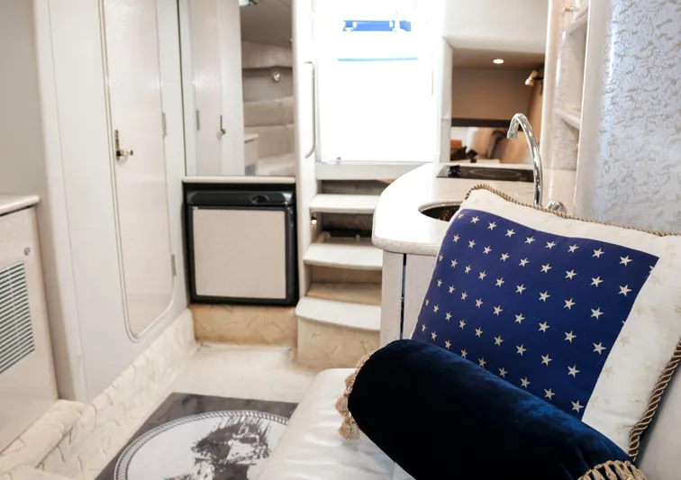  Yacht Photos Pics Interior of a 2003 Formula 370 Super Sport boat with plush seating and modern amenities.