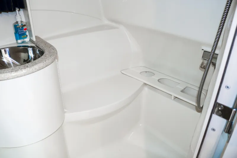  Yacht Photos Pics 2003 Formula 370 Super Sport boat bathroom with sink and shower.