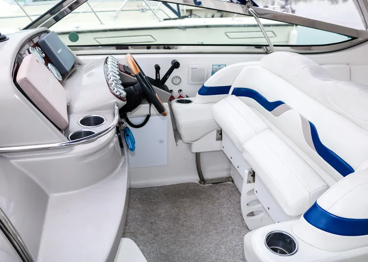  Yacht Photos Pics 2003 Formula 370 Super Sport boat interior with white and blue seating.