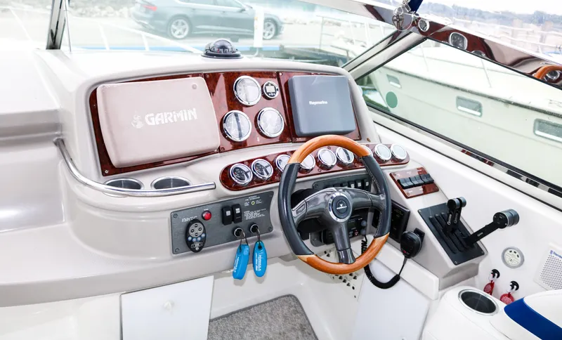  Yacht Photos Pics 2003 Formula 370 Super Sport boat dashboard with Garmin navigation system.