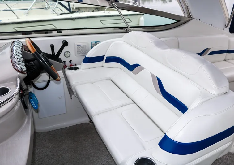  Yacht Photos Pics 2003 Formula 370 Super Sport boat interior with white and blue seating.