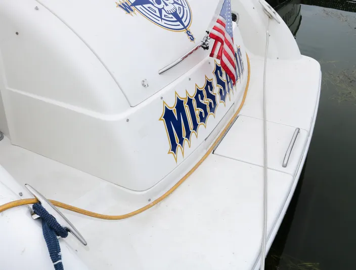  Yacht Photos Pics 2003 Formula 370 Super Sport boat with American flag and Miss name on stern.