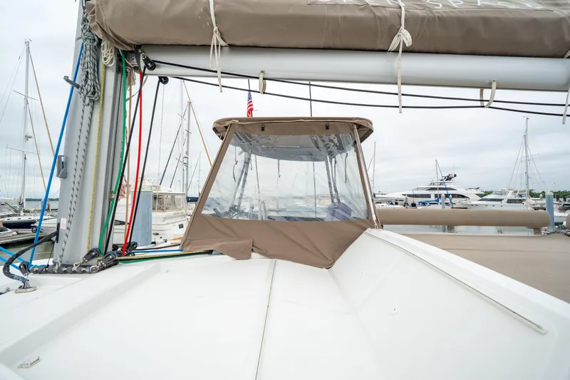 Cielo Yacht Photos Pics 2023 Bali 4.2 yacht with covered cockpit, docked at marina with sailboats.