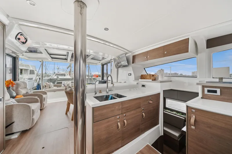 Cielo Yacht Photos Pics Modern interior of 2023 Bali 4.2 yacht with sleek kitchen and comfortable seating.