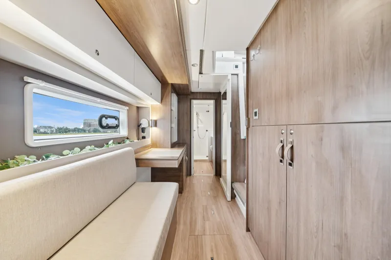 Cielo Yacht Photos Pics Modern interior of 2023 Bali 4.2 yacht with sleek wood finishes and ample natural light.