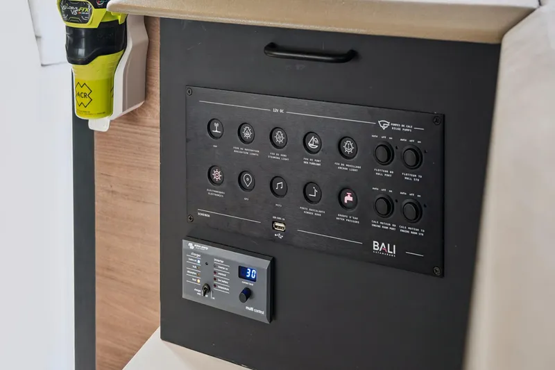 Cielo Yacht Photos Pics Control panel of a 2023 Bali 4.2 catamaran with various switches and indicators.