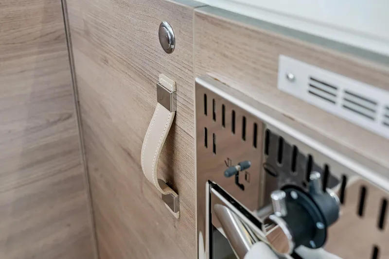 Cielo Yacht Photos Pics Modern kitchen detail in Bali 4.2 model, 2023, featuring sleek wood and metal design.