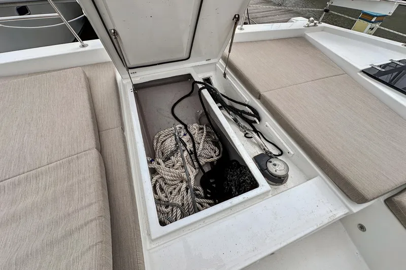 Cielo Yacht Photos Pics Open storage compartment on 2023 Bali 4.2 boat with ropes and equipment.