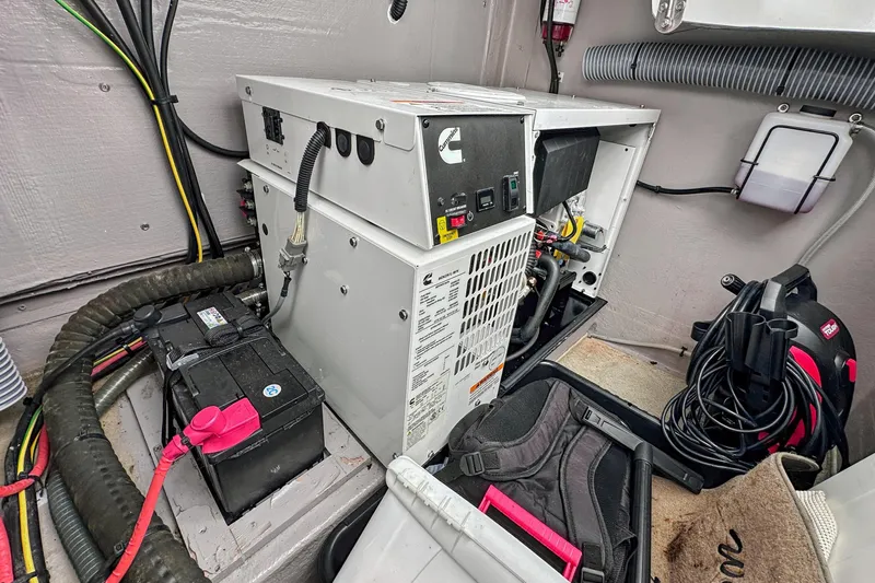Cielo Yacht Photos Pics Electrical system in a 2023 Bali 4.2 boat, featuring a generator and battery setup.