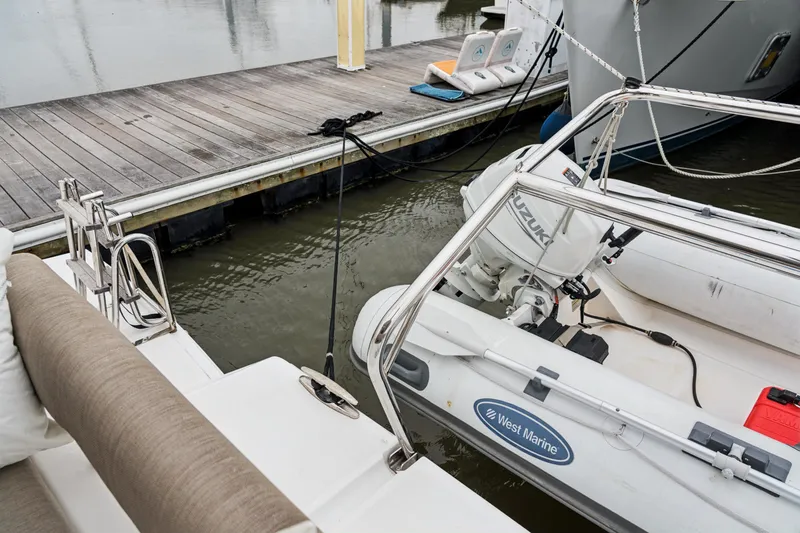 Cielo Yacht Photos Pics Docked Bali 4.2 boat with Suzuki outboard motor and West Marine inflatable, 2023 model.