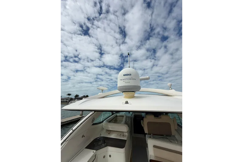  Yacht Photos Pics 2014 Sea Ray 470 Sundancer yacht with satellite dome under cloudy sky.