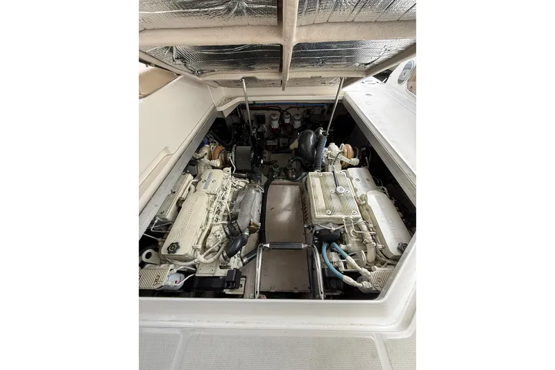  Yacht Photos Pics Engine compartment of 2014 Sea Ray 470 Sundancer yacht, showcasing dual engines.