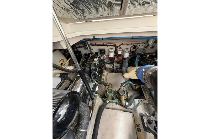  Yacht Photos Pics Engine room of 2014 Sea Ray 470 Sundancer, showcasing mechanical components and systems.