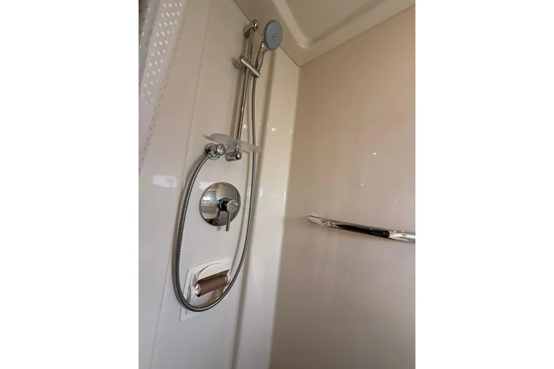  Yacht Photos Pics Shower area in 2014 Sea Ray 470 Sundancer yacht, featuring modern fixtures.