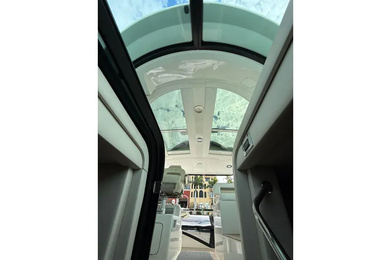  Yacht Photos Pics Interior view of 2014 Sea Ray 470 Sundancer yacht with glass ceiling.