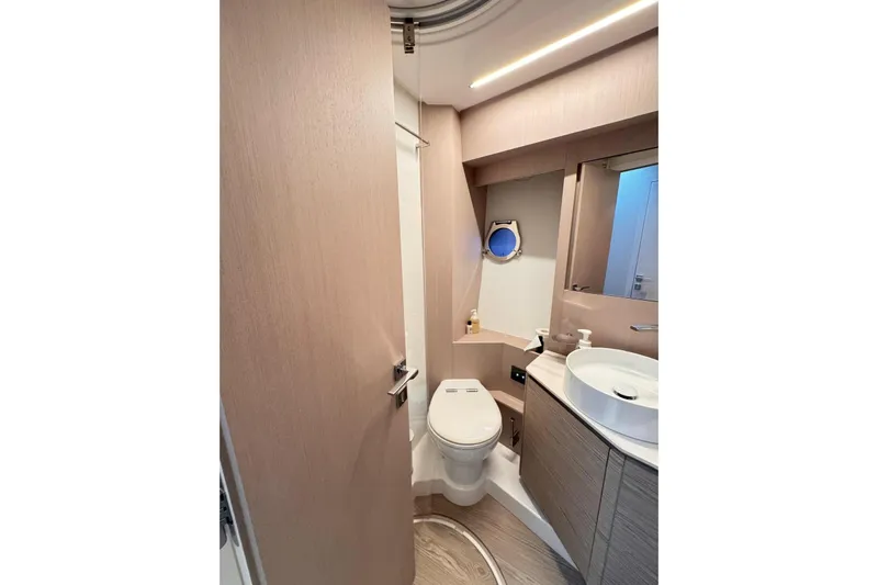  Yacht Photos Pics Luxurious bathroom in 2025 Ferretti Yachts 500, featuring modern fixtures and elegant design.
