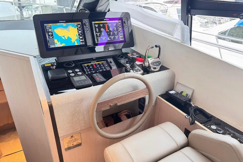  Yacht Photos Pics Helm of 2025 Ferretti Yachts 500 with advanced navigation systems and controls.