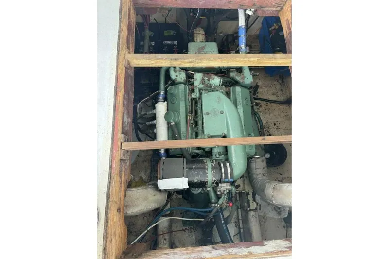 Annabel C Yacht Photos Pics Engine compartment of a 1987 Monroe Custom 52, showcasing mechanical components.