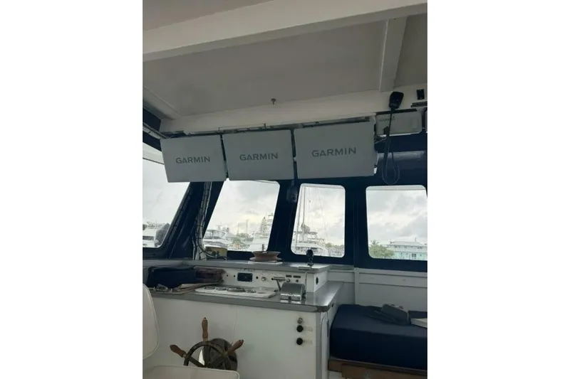 Annabel C Yacht Photos Pics Interior of 1987 Monroe Custom 52 boat with Garmin navigation displays.