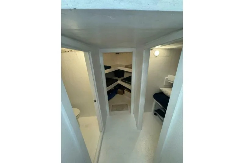 Annabel C Yacht Photos Pics Interior of 1987 Monroe Custom 52 boat with compact sleeping quarters.