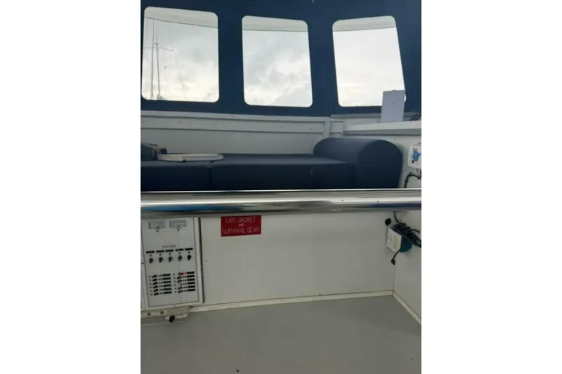 Annabel C Yacht Photos Pics Interior of 1987 Monroe Custom 52 boat with seating and safety equipment.