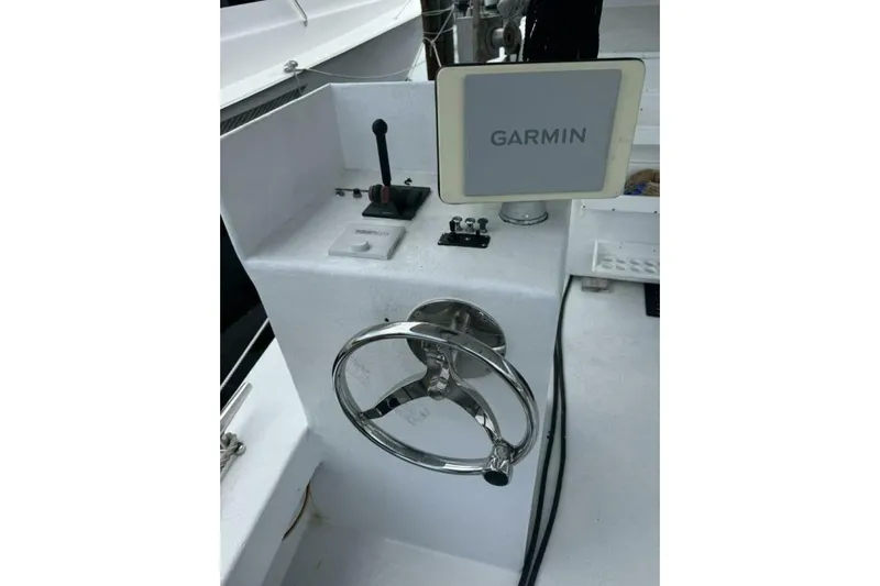 Annabel C Yacht Photos Pics Boat steering console with Garmin display, Monroe Custom 52, 1987 model.