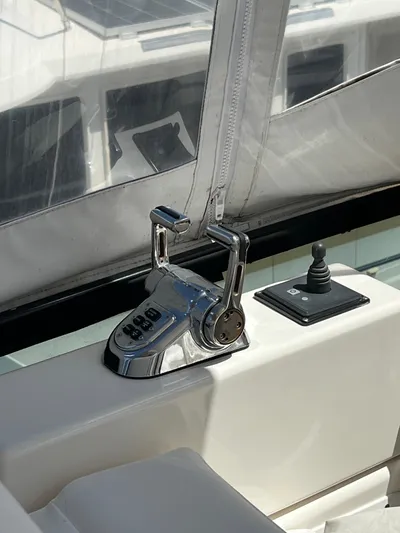  Yacht Photos Pics 2005 Neptunus 62 Flybridge yacht controls with joystick and throttle levers.