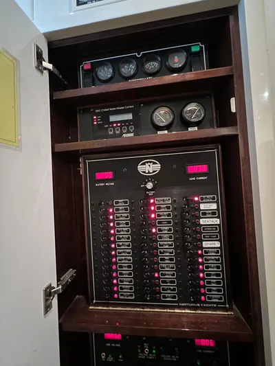  Yacht Photos Pics Electrical panel of 2005 Neptunus 62 Flybridge yacht with gauges and switches.