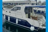 2015 Sas-Vektor 950 yacht docked at marina, featuring sleek design and modern amenities.