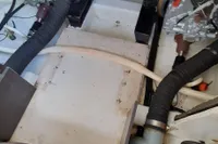 Engine compartment of a 2015 Sas-Vektor 950 boat with visible hoses and components.