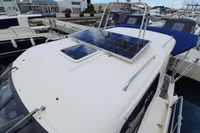 Sas-Vektor 950 boat with solar panel on deck, docked at marina, 2015 model.