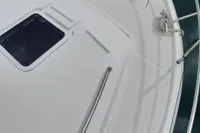 Top view of a 2015 Sas-Vektor 950 boat deck with railing and hatch.
