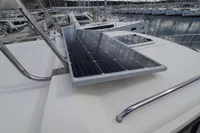 Solar panel on Sas-Vektor 950 yacht, 2015 model, docked in marina.